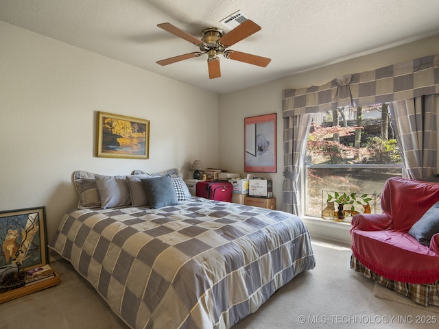 8404 S Toledo Ave, Tulsa, OK 74137 - carpeted bedroom with ceiling fan and visible vents