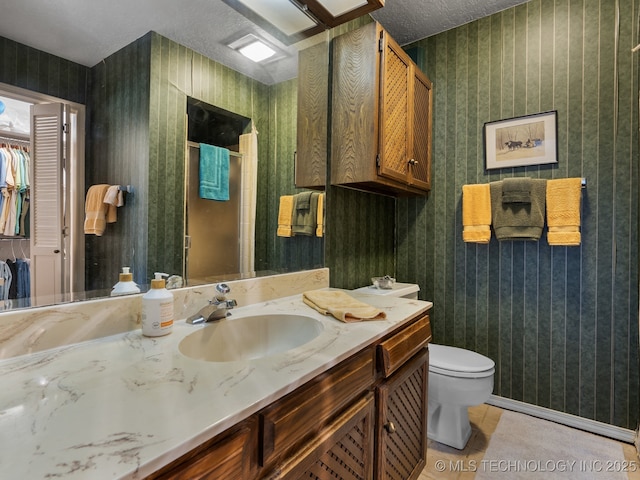 8404 S Toledo Ave, Tulsa, OK 74137 - full bathroom featuring vanity, wallpapered walls, and toilet