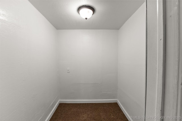 interior space featuring baseboards