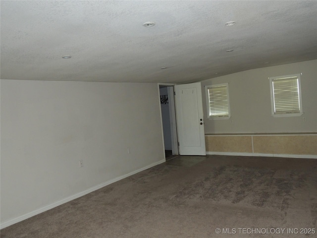 906 S 85th E Ave, Tulsa, OK 74112 - empty room featuring baseboards, carpet flooring, and a textured ceiling