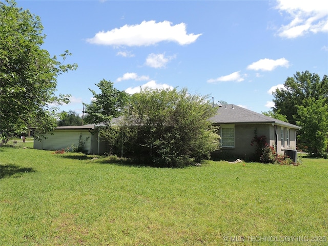 906 S 85th E Ave, Tulsa, OK 74112 - view of yard featuring central AC unit