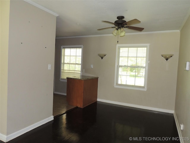 906 S 85th E Ave, Tulsa, OK 74112 - interior space featuring crown molding, a ceiling fan, baseboards, and a healthy amount of sunlight