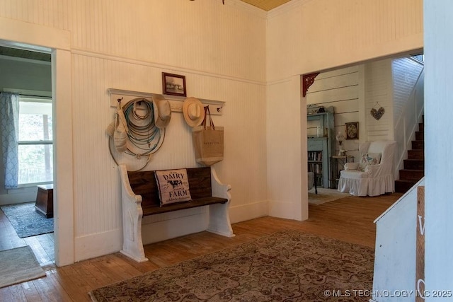 856 N 4243rd Rd, Hugo, OK 74743 - hallway featuring wood finished floors, stairway, and a high ceiling