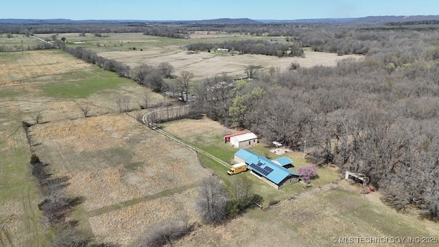 birds eye view of property featuring a rural view