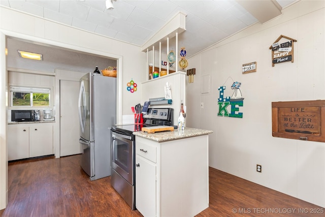 449774 E 356th Rd, Afton, OK 74331 - kitchen featuring white cabinets, stainless steel appliances, and dark wood finished floors