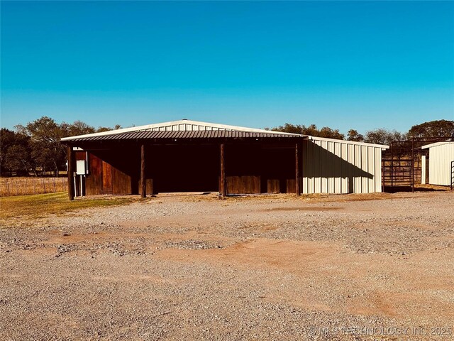 view of outbuilding featuring an outdoor structure