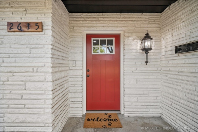 2615 E 59th St, Tulsa, OK 74105 - property entrance featuring brick siding