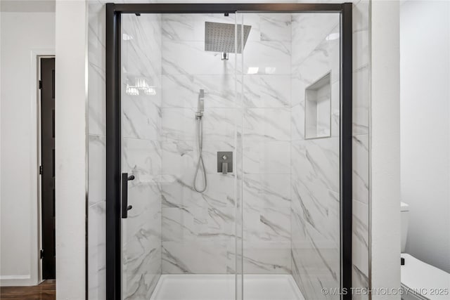 2615 E 59th St, Tulsa, OK 74105 - bathroom featuring a marble finish shower and toilet