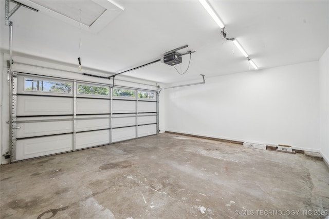 2615 E 59th St, Tulsa, OK 74105 - garage featuring a garage door opener