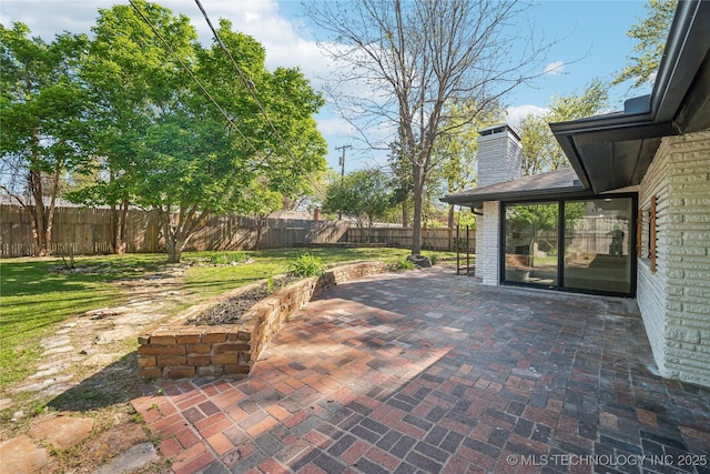 2615 E 59th St, Tulsa, OK 74105 - view of patio with a fenced backyard