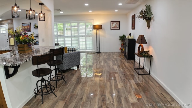 2615 E 59th St, Tulsa, OK 74105 - living area featuring recessed lighting, baseboards, dark wood-style floors, and visible vents