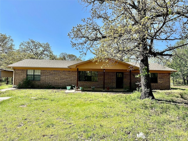 4665 Primrose, Sulphur, OK 73086 - ranch-style house with a front lawn and brick siding