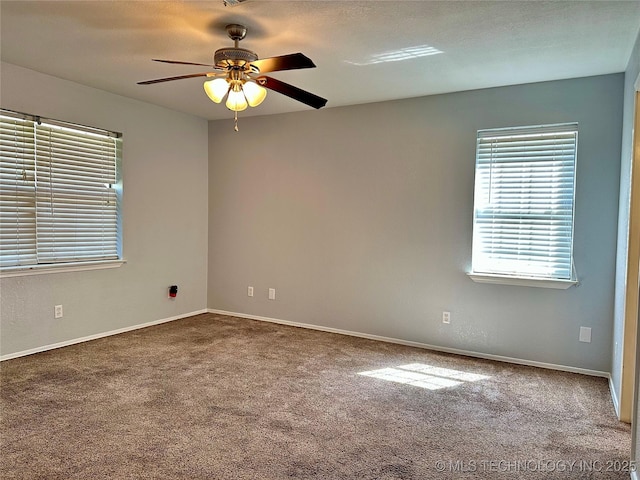 4665 Primrose, Sulphur, OK 73086 - spare room featuring carpet floors, a ceiling fan, and baseboards