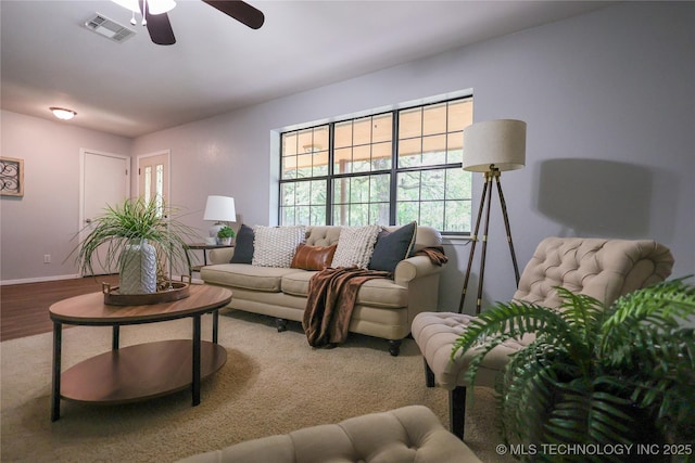 4665 Primrose, Sulphur, OK 73086 - living area featuring ceiling fan, baseboards, and wood finished floors