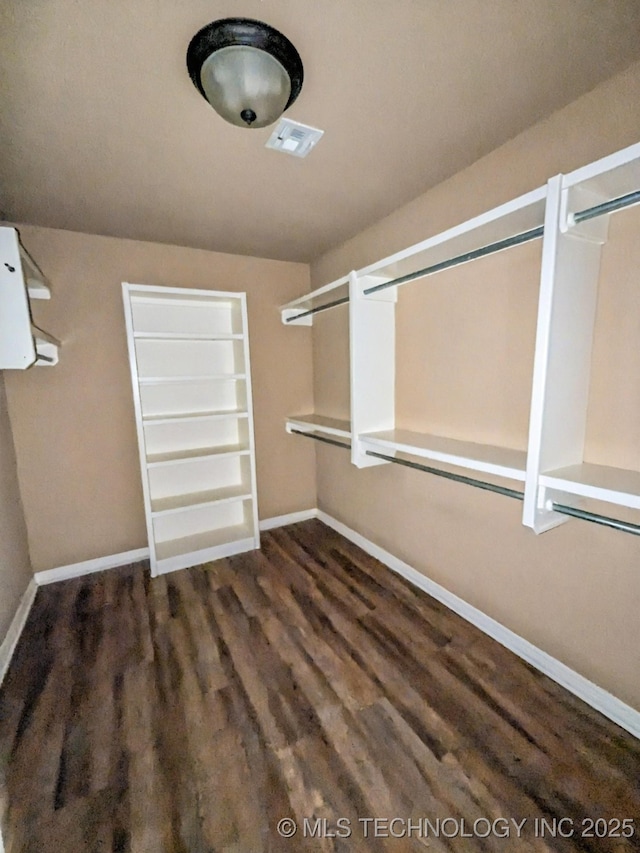 1809 E Montgomery St, Broken Arrow, OK 74012 - walk in closet featuring wood finished floors