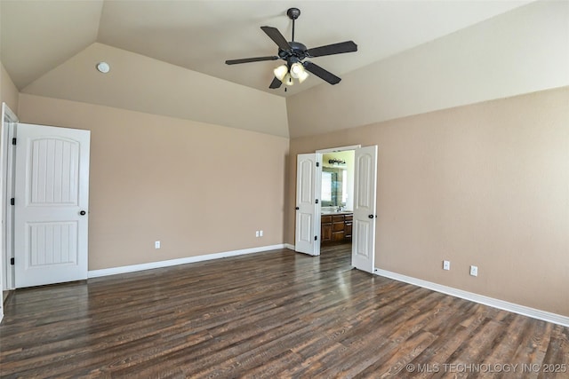 1809 E Montgomery St, Broken Arrow, OK 74012 - empty room with lofted ceiling, dark wood-style floors, ceiling fan, and baseboards