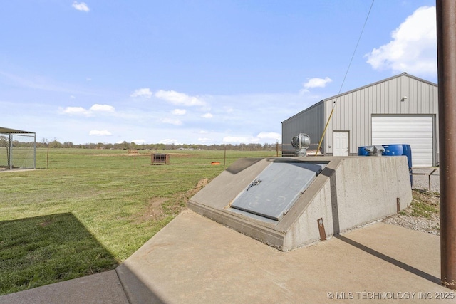 9720 S 4475th Rd, Miami, OK 74354 - view of storm shelter with a rural view, a yard, and an outdoor structure