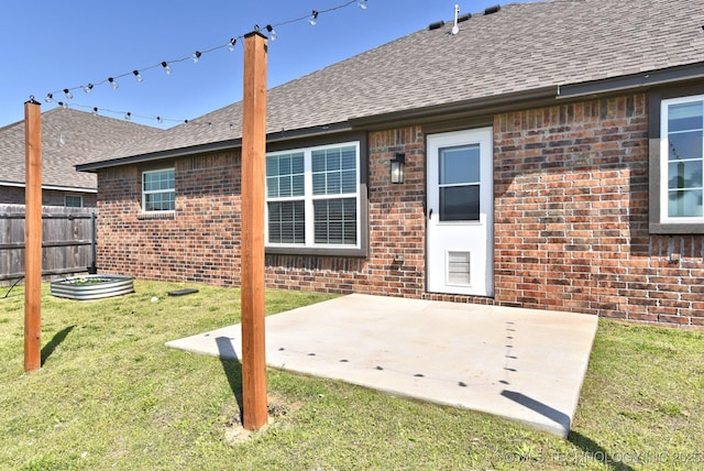 27616 E 109th Pl S, Coweta, OK 74429 - back of property with brick siding, a shingled roof, and a patio