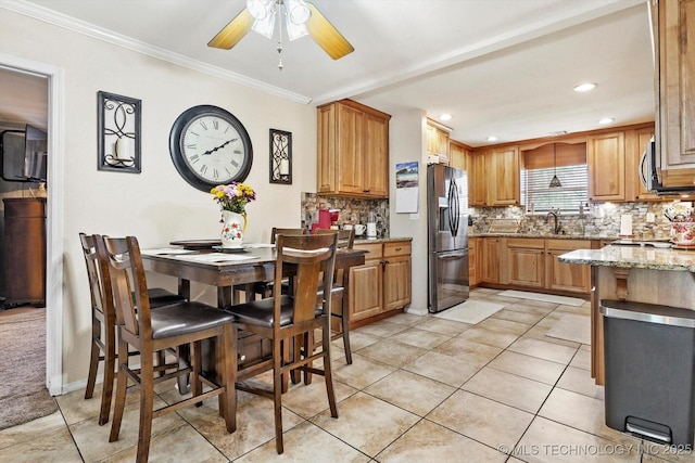 2909 Haddock Dr, Muskogee, OK 74401 - dining space featuring recessed lighting, a ceiling fan, light tile patterned flooring, and ornamental molding