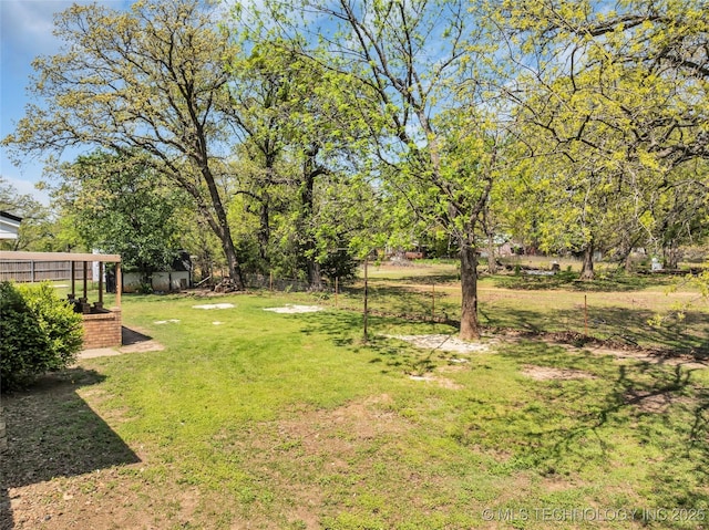 view of yard with fence