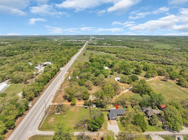 bird's eye view with a forest view