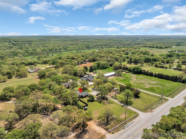 drone / aerial view with a forest view