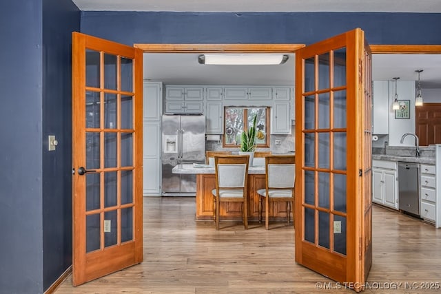 dining area with light wood finished floors