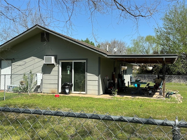 236 Bluebird Ln, Colbert, OK 74733 - rear view of property featuring a fenced backyard, a patio area, and a wall mounted air conditioner