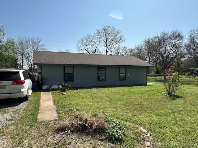 236 Bluebird Ln, Colbert, OK 74733 - view of front of property with a front yard and a shingled roof