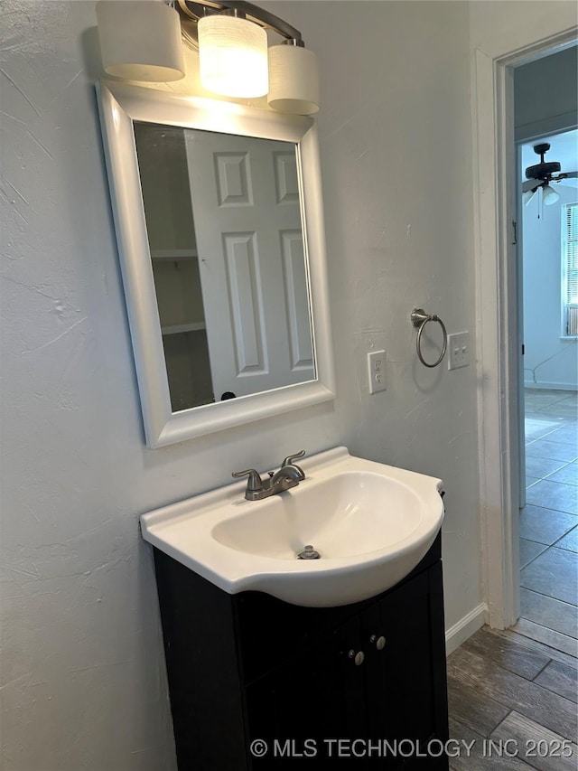 236 Bluebird Ln, Colbert, OK 74733 - bathroom with vanity and ceiling fan