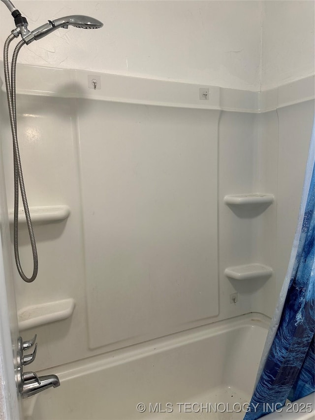 236 Bluebird Ln, Colbert, OK 74733 - bathroom featuring shower / tub combo