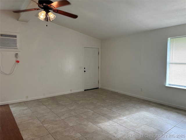 236 Bluebird Ln, Colbert, OK 74733 - spare room featuring a wall unit AC, vaulted ceiling, and a ceiling fan
