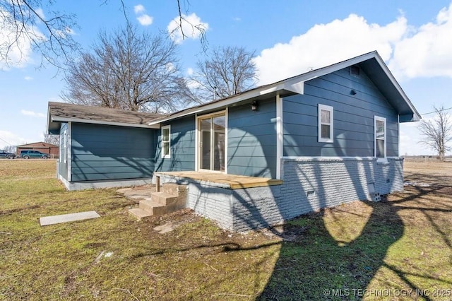 exterior space featuring a yard