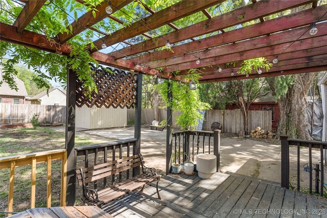 1235 S Atlanta Pl, Tulsa, OK 74104 - deck featuring a fenced backyard, a patio, and a pergola