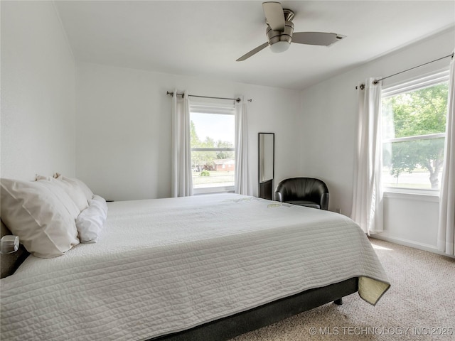 bedroom featuring carpet flooring and ceiling fan