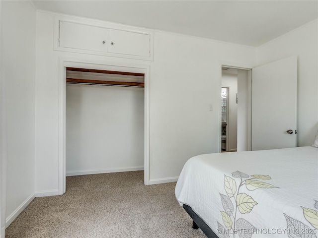 338 E 45th Pl, Tulsa, OK 74105 - bedroom featuring light colored carpet and a closet