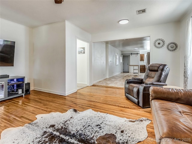 338 E 45th Pl, Tulsa, OK 74105 - living room with wood finished floors and ornamental molding