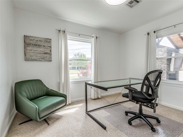 office area with baseboards and visible vents