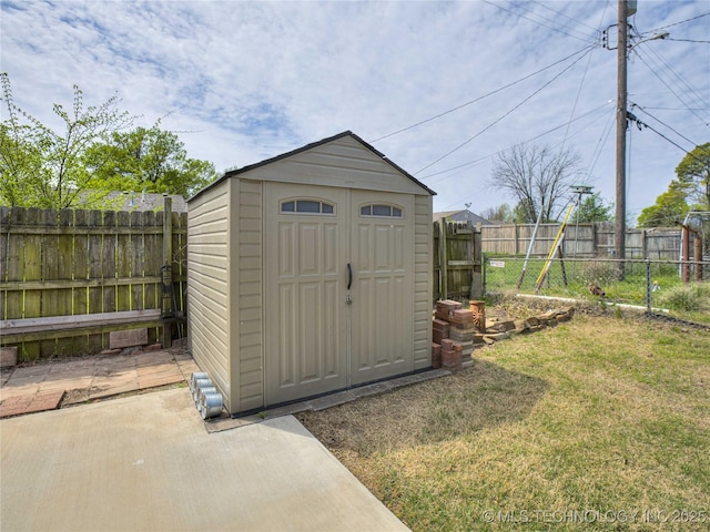 338 E 45th Pl, Tulsa, OK 74105 - view of shed featuring a fenced backyard
