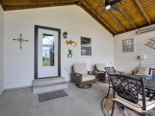 view of patio featuring entry steps and ceiling fan