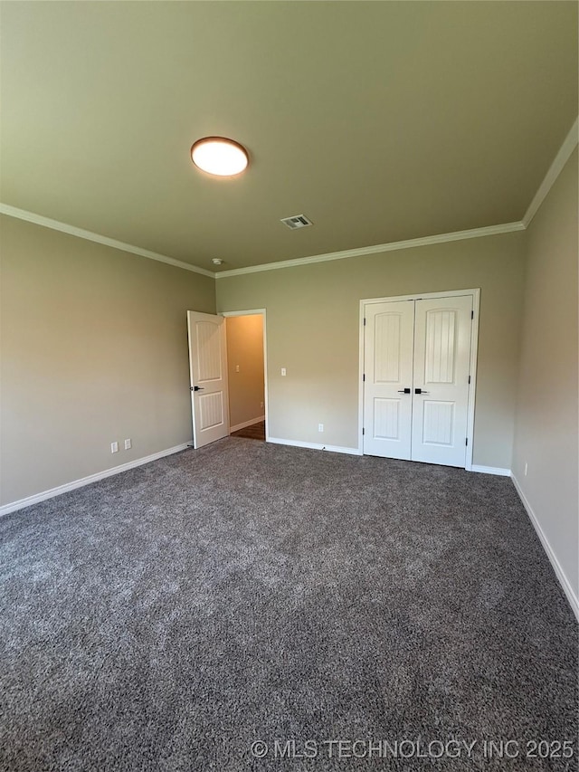 unfurnished bedroom with visible vents, crown molding, and baseboards