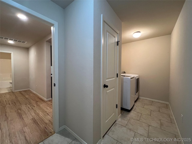 6370 E 124th Ct, Bixby, OK 74008 - laundry area with washer and clothes dryer and baseboards