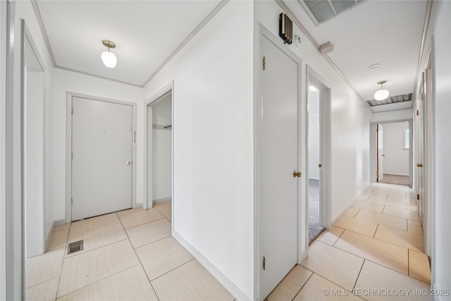 5656 S Zunis Ave, Tulsa, OK 74105 - hallway featuring light tile patterned floors