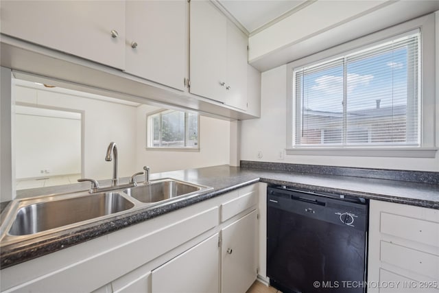 5656 S Zunis Ave, Tulsa, OK 74105 - kitchen with dishwasher, a sink, plenty of natural light, and dark countertops