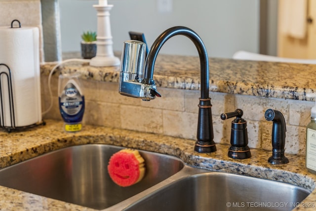 6199 E 144th St N, Collinsville, OK 74021 - kitchen view of decorative backsplash and light stone countertops
