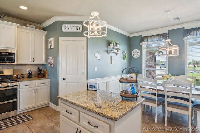 6199 E 144th St N, Collinsville, OK 74021 - kitchen featuring stainless steel refrigerator with ice dispenser, white cabinets, tasteful backsplash, light stone counters, and recessed lighting