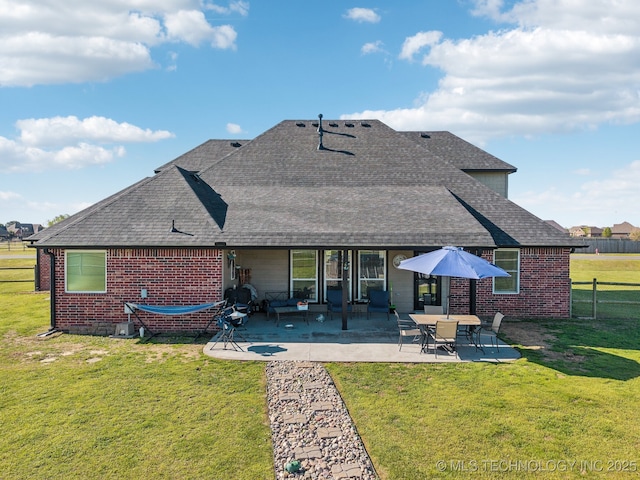 6199 E 144th St N, Collinsville, OK 74021 - rear view of property featuring brick siding, roof with shingles, and a patio