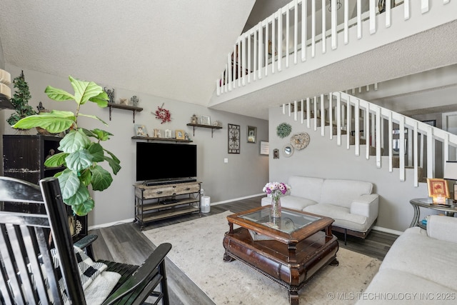 4208 W Urbana St S, Broken Arrow, OK 74012 - living room with wood finished floors, stairway, baseboards, and vaulted ceiling