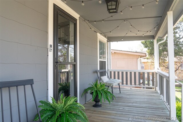 511 N Main St, Sand Springs, OK 74063 - wooden deck with covered porch