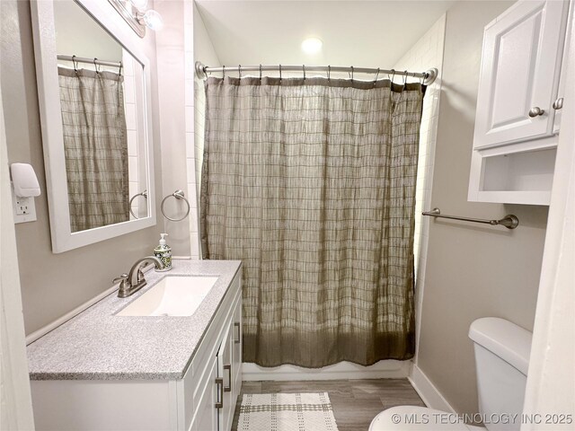 511 N Main St, Sand Springs, OK 74063 - bathroom featuring toilet, shower / bath combination with curtain, and vanity